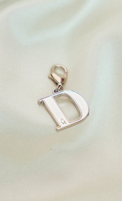 Alphabet dUCk Charm in D